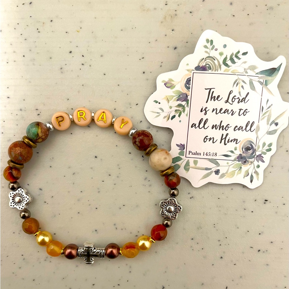 Pray bracelet in earth tones with gold and silver